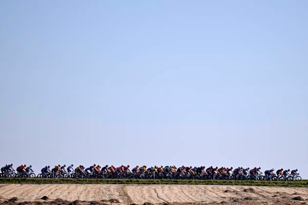 Danilith Nokere Koerse 2025 cycling race NOKERE, BELGIUM - MARCH 19 : illustration picture peloton during the Men Elite UCI 1.Pro 78th Danilith Nokere Koerse cycling race with start in Deinze and finish in Nokere (188,2 km) on March 19, 2025 in Nokere, Belgium, 19 03 2025 ( Motordriver Rodrique Verfaillie & Nokere Belgium  Copyright: xTomasxSiskx