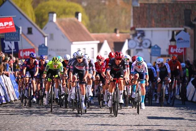 Danilith Nokere Koerse 2025 cycling race NOKERE, BELGIUM - MARCH 19 : illustration picture peloton at the Nokereberg during the Men Elite UCI 1.Pro 78th Danilith Nokere Koerse cycling race with start in Deinze and finish in Nokere (188,2 km) on March 19, 2025 in Nokere, Belgium, 19 03 2025 ( Motordriver Rodrique Verfaillie & Nokere Belgium  Copyright: xTomasxSiskx