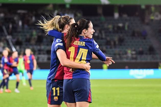 Soccer I Women I 2024 2025 season I Champions League I Quarter-finals I VfL Wolfsburg FC Barcelona I 19 03 2025 Goal celebration Alexia Putellas 11, FC Barcelona and Aitana Bonmati 14, FC Barcelona after the 1-0 goal from the visitors perspective Wolfsburg Volkswagen Arena Niedersachsen Germany Copyright: xLobeca InesxHähnelx