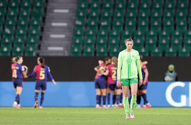 Jule Brand VfL Wolfsburg disappointed as Barca celebrate 0 1 Soccer, Women, Season 2024 2025, UWCL Quarterfinals, First leg, Volkswagen Arena , VfL Wolfsburg vs FC Barcelona DFL REGULATIONS PROHIBIT ANY USE OF PHOTOGRAPHS AS IMAGE SEQUENCES AND OR QUASI VIDEO