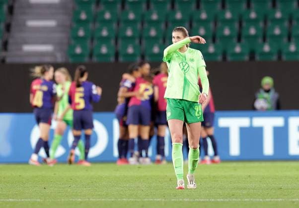 Jule Brand VfL Wolfsburg disappointed as Barca celebrate 0 1 Soccer, Women, Season 2024 2025, UWCL Quarterfinals, First leg, Volkswagen Arena , VfL Wolfsburg vs FC Barcelona DFL REGULATIONS PROHIBIT ANY USE OF PHOTOGRAPHS AS IMAGE SEQUENCES AND OR QUASI VIDEO