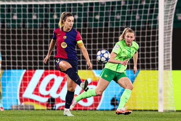 Alexia Putellas FC Barcelona,11 vs Sarai Linder VfL Wolfsburg,39 Womens Champions League quarter-final 2024 2025 season VfL Wolfsburg vs FC Barcelona at the Volkswagen Arena in Wolfsburg action,soccer,woman,women,ladies,Germany,19 03 2025