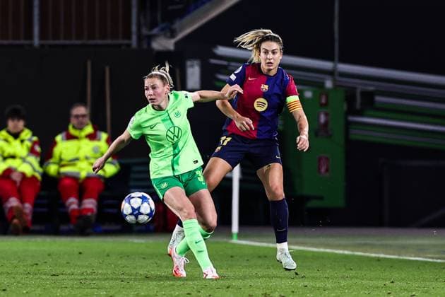Alexia Putellas FC Barcelona,11 vs Sarai Linder VfL Wolfsburg,39 Womens Champions League quarter-final 2024 2025 season VfL Wolfsburg vs FC Barcelona at the Volkswagen Arena in Wolfsburg action,soccer,woman,women,ladies,Germany,19 03 2025