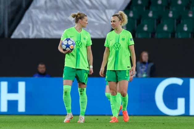 Alexandra Popp VfL Wolfsburg and Lena Lattwein VfL Wolfsburg look dejected, UEFA Women s Champions League Quarter Finals First Leg, VfL Wolfsburg and FC Barcelona, Volkswagen Arena on March 19, 2025 in Wolfsburg, Germany Photo by Marco Steinbrenner DeFodi Images Alexandra Popp VfL Wolfsburg and Lena Lattwein VfL Wolfsburg look dejected, UEFA Women s Champions League Quarter Finals First Leg, VfL Wolfsburg and FC Barcelona, Volkswagen Arena, March 19, 2025 in Wolfsburg, Germany Photo by Marco Steinbrenner DeFodi Images