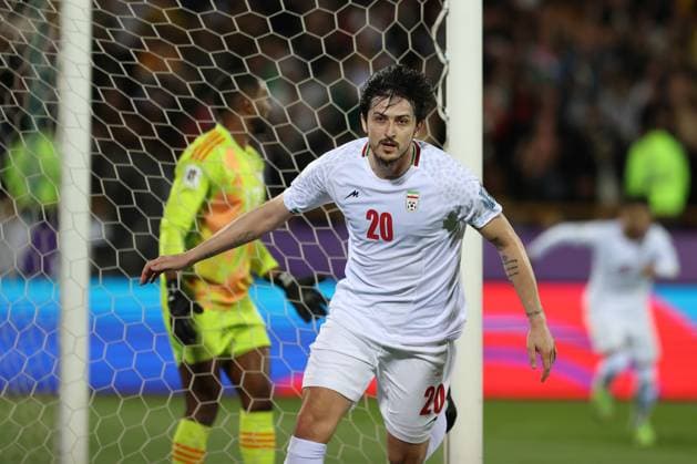 TEHRAN, IRAN - 20 March 2025 - Sardar Azmoun of Iran celebrates after scoring a opening goal during the FIFA World Cup, WM, Weltmeisterschaft, Fussball 2026 Qualification AFC, Group A round 7 match between Iran and UAE, United Arabic Emirates national football team at Azadi Stadium in Tehran, Iran Iran v UAE - FIFA World Cup 2026 Qualification AFC, Group A, round 7 match. Copyright: xSoccerxImagesx