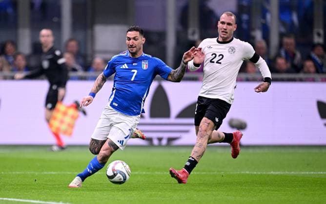 FOOTBALL UEFA Nations League 2024 2025 Quarter-final first leg in Milan Italy Germany 20 03 2025 Matteo Politano left, Italy v David Raum right, Germany