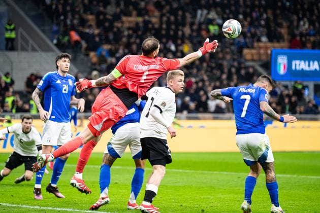 Gianluigi Donnarumma Italy 01 fists the ball away Jonathan Burkhardt Germany, 07 ITA, Italy ITA vs Germany GER , Football international, UEFA Nations League quarter-final round1, 2024 2025, 20 03 2025 ITA, Italy ITA vs Germany GER , Football international, UEFA Nations League quarter-final round1, 2024 2025, 20 03 2025 Milan Copyright: xEibner-Pressefoto RogerxBuerkex EP_RBE