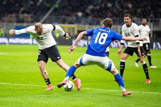 Nicolo Barella Italy 18 vs David Raum Germany, 22 ITA, Italy ITA vs Germany GER , Football international, UEFA Nations League quarter-final round1, 2024 2025, 20 03 2025 ITA, Italy ITA vs Germany GER , Football international, UEFA Nations League quarter-final round1, 2024 2025, 20 03 2025 Milan Copyright: xEibner-Pressefoto RogerxBuerkex EP_RBE