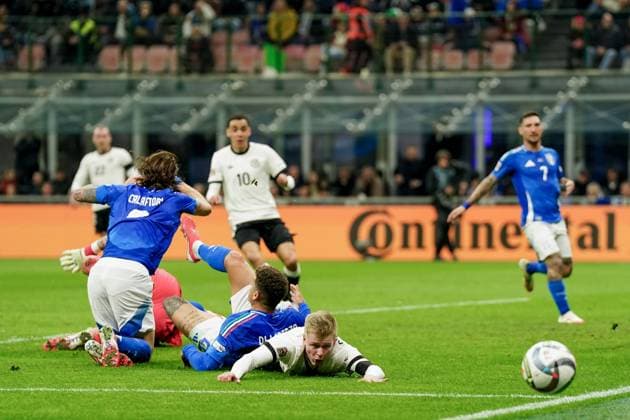 Milan, Italy, 20th March 2025: Jonathan Burkardt (7 Germany) on the ground after an encounter during the UEFA Nations League Quarterfinal football match between Italy and Germany at Stadio San Siro in Milan, Italy. (Daniela Porcelli SPP) Copyright: xDanielaxPorcellix xSPPx spp-en-DaPoSp-20250320-DP202660