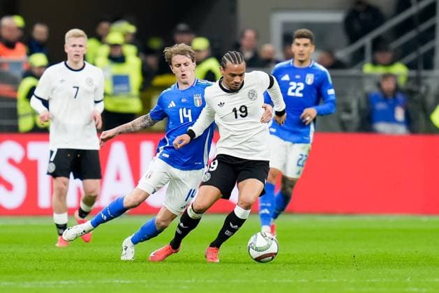 Italy v Germany - UEFA Nations League Quarterfinal Leg One Nicolo Rovella of Italy and Leroy Sane of Germany compete for the ball during the UEFA Nations League Quarter Final Leg One match between Italy and Germany at Stadio Giuseppe Meazza on March 20, 2025 in Milan, Italy. Milan Stadio Giuseppe Meazza Milan Italy Copyright: xGiuseppexMaffiax NationsLeague_Italy-Germany_200325_BRU7720