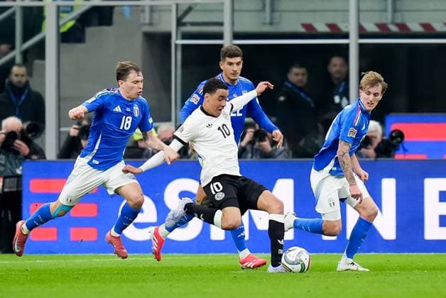 Italy v Germany - UEFA Nations League Quarterfinal Leg One Jamal Musiala of Germany is challenged by Nicolo™ Barella of Italy during the UEFA Nations League Quarter Final Leg One match between Italy and Germany at Stadio Giuseppe Meazza on March 20, 2025 in Milan, Italy. Milan Stadio Giuseppe Meazza Milan Italy Copyright: xGiuseppexMaffiax NationsLeague_Italy-Germany_200325_BRU7822