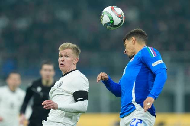 Jonathan Burkadt (Germany) and Giovanni Di Lorenzo (Italy) battle for the ball, UEFA Nations League Quarterfinal First leg, Italy and Germany, San Siro Stadium, March 20, 2025, Milan, Italy.