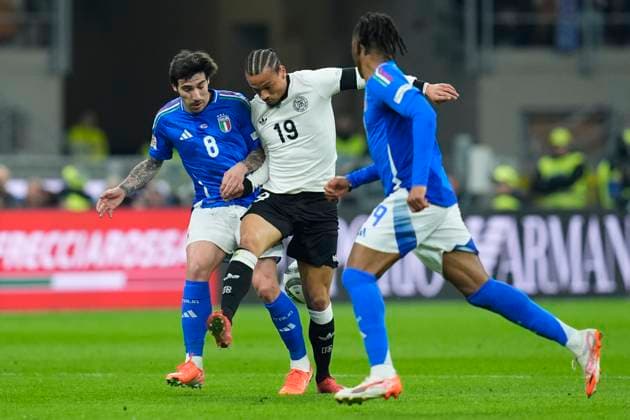 Sandro Tonali (Italy) and Leroy Sane (Germany) battle for the ball, UEFA Nations League Quarterfinal First leg, Italy and Germany, San Siro Stadium, March 20, 2025, Milan, Italy.