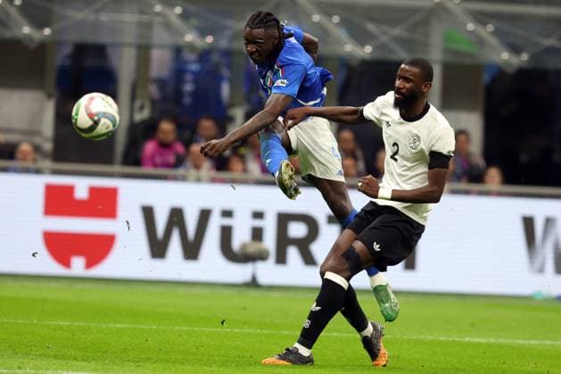 CALCIO - UEFA Nations League - Quarter Finals - Italy vs Germany Milan, Italy 20.03.2025: Maise Kean of Italy, Antonio Rudiger of Germany seen in action during the Uefa Nations League 2025, quarter finals, football match between Italy vs Germany at Giuseppe Meazza stadium in Milan. Milan Italy  Copyright: xIPAxSport ABACAx