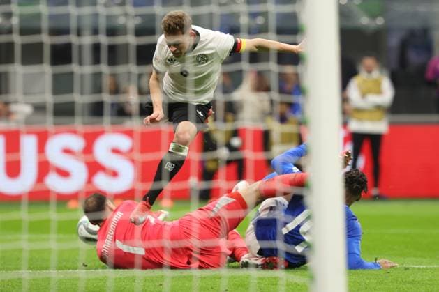 Uefa Nations League 2025: Quarter finals Italy vs Germany at Giuseppe Meazza Stadium in Milan Milan, Italy 20.03.2025: Gianluigi Donnarumma of Italy, Joshua Kimmich of Germany, Destiny Udogie of Italy seen in action during the Uefa Nations League 2025, quarter finals, football match between Italy vs Germany at Giuseppe Meazza stadium in Milan. milan Giuseppe Meazza italy Italy Copyright: xmarcoxiacobucci