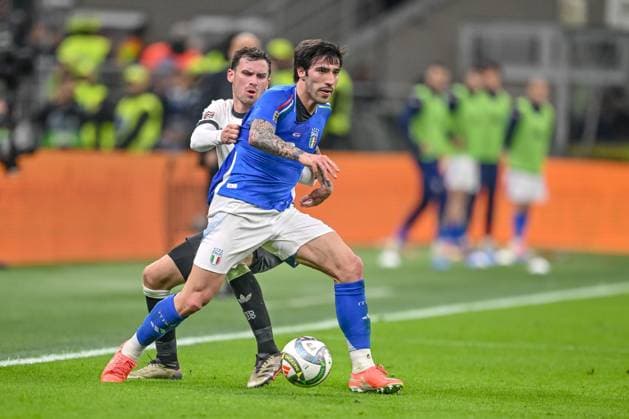 Pascal Gross Germany and Sandro Tonali Italy battle for the ball during the UEFA Nations League quarterfinal leg one match between Italy and Germany at Stadio San Siro on March 20, 2025 in Milan, Italy Photo by Harry Langer DeFodi Images