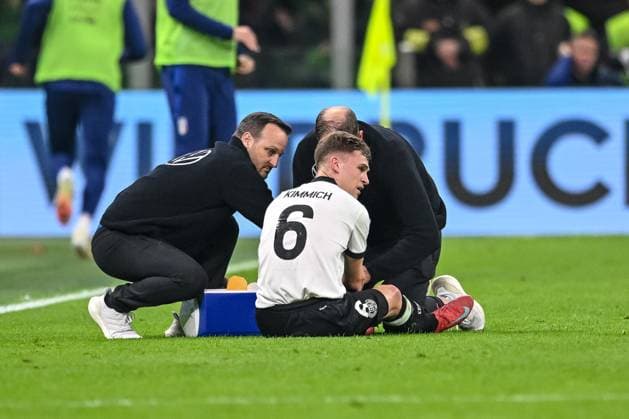 Joshua Kimmich Germany injured on the ground during the UEFA Nations League quarterfinal leg one match between Italy and Germany at Stadio San Siro on March 20, 2025 in Milan, Italy Photo by Harry Langer DeFodi Images