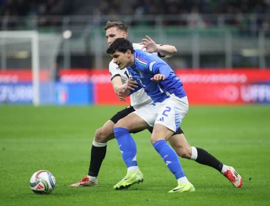 Raoul Bellanova of Italy and Nico Schlotterbeck of Germany during the UEFA Nations League, Quarter-finals, 1st leg, football match between the national team, Nationalteam of Italy and the national team of Germany, on 20 March 2025, at Giuseppe Meazza stadium, San Siro, Milan, Italy. Photo Nderim Kaceli  Copyright: xNderimxKaceli IPAxSportx xipa-agency.netx xx IPA_55557282 IPA_Agency_IPA55557282