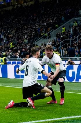 Italy v Germany - UEFA Nations League Quarterfinal Leg One Leon Goretzka of Germany celebrates with Joshua Kimmich after scoring second goal during the UEFA Nations League Quarter Final Leg One match between Italy and Germany at Stadio Giuseppe Meazza on March 20, 2025 in Milan, Italy. Milan Stadio Giuseppe Meazza Milan Italy Copyright: xGiuseppexMaffiax NationsLeague_Italy-Germany_200325_BRU3999