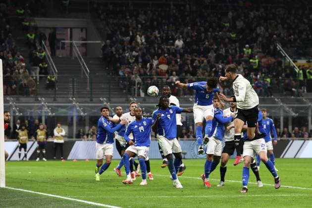 March 20, 2025, Milan, Lombardy, Italy: LEON GORETZKA 8 of Germany celebrates with his teammates and notably the assist by JOSHUA KIMMICH 6 in the UEFA Nations League 2024 quarterfinal first leg between ITALY and GERMANY at San Siro Stadium in Milan, Italy Milan Italy - ZUMAc179 20250320_zep_c179_084 Copyright: xMickaelxChavetx