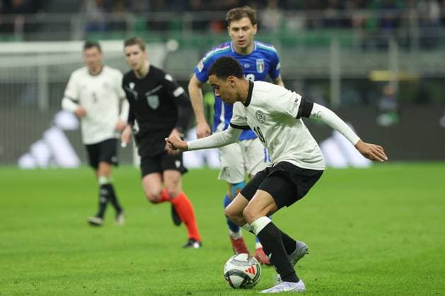 Uefa Nations League 2025: Quarter finals Italy vs Germany at Giuseppe Meazza Stadium in Milan Milan, Italy 20.03.2025: Jamal Musiala of Germany seen in action during the Uefa Nations League 2025, quarter finals, football match between Italy vs Germany at Giuseppe Meazza stadium in Milan. milan Giuseppe Meazza italy Italy Copyright: xmarcoxiacobucci