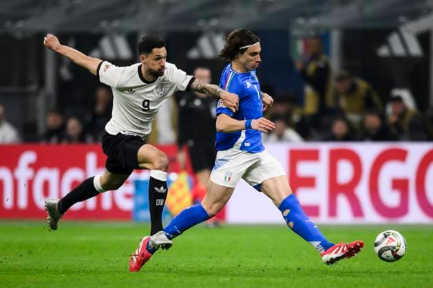 Italy v Germany - UEFA Nations League Riccardo Calafiori of Italy competes for the ball with Tim Kleindienst of Germany during the UEFA Nations League quarterfinal first leg football match between Italy and Germany. Milan Italy Copyright: xNicolòxCampox