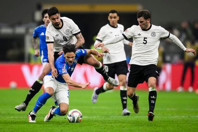 Italy v Germany - UEFA Nations League Samuele Ricci of Italy competes for the ball with Tim Kleindienst and Pascal Gross of Germany during the UEFA Nations League quarterfinal first leg football match between Italy and Germany. Milan Italy Copyright: xNicolòxCampox