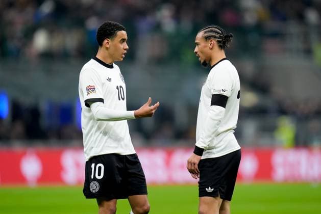 Italy v Germany - UEFA Nations League Quarterfinal Leg One Jamal Musiala of Germany gives instructions to Leroy Sane of Germany during the UEFA Nations League Quarter Final Leg One match between Italy and Germany at Stadio Giuseppe Meazza on March 20, 2025 in Milan, Italy. Milan Stadio Giuseppe Meazza Milan Italy Copyright: xGiuseppexMaffiax NationsLeague_Italy-Germany_200325_BRU9774