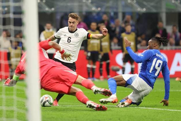CALCIO - UEFA Nations League - Quarter Finals - Italy vs Germany Milan, Italy 20.03.2025: Gianluigi Donnarumma of Italy, Joshua Kimmich of Germany, Destiny Udogie of Italy seen in action during the Uefa Nations League 2025, quarter finals, football match between Italy vs Germany at Giuseppe Meazza stadium in Milan. Milan Italy  Copyright: xIPAxSport ABACAx