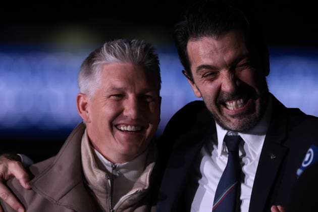 Sport Bilder des Tages Milan, Italy, 20th March 2025. Former footballers Bastian Schweinsteiger and Ginaluigi Buffon react prior to the UEFA Nations League match at Giuseppe Meazza, Milan. Picture credit should read: Jonathan Moscrop Sportimage EDITORIAL USE ONLY. No use with unauthorised audio, video, data, fixture lists, club league logos or live services. Online in-match use limited to 120 images, no video emulation. No use in betting, games or single club league player publications. SPI_088_JM_ITALY_GERMANY_UNL_ SPI-3749-0088