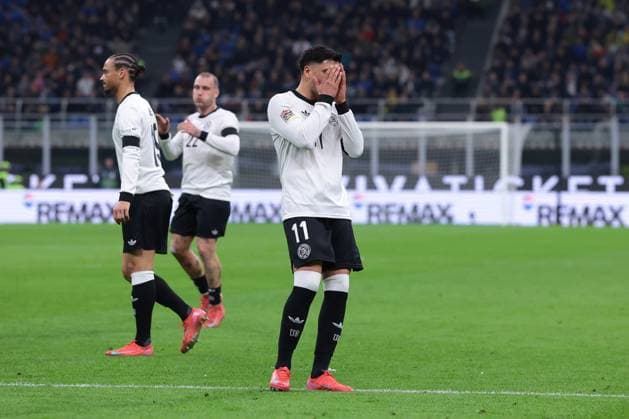 Milan, Italy, 20th March 2025. Nadiem Amiri of Germany reacts after firing a free kick narrowly wide of the mark during the UEFA Nations League match at Giuseppe Meazza, Milan. Picture credit should read: Jonathan Moscrop Sportimage EDITORIAL USE ONLY. No use with unauthorised audio, video, data, fixture lists, club league logos or live services. Online in-match use limited to 120 images, no video emulation. No use in betting, games or single club league player publications. SPI_070_JM_ITALY_GERMANY_UNL_ SPI-3749-0070