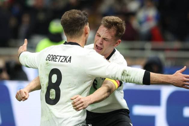 CALCIO - UEFA Nations League - Quarter Finals - Italy vs Germany Milan, Italy 20.03.2025: Leon Goretzka of Germany score the goal and celebrate with Joshua Kimmich of Germany during the Uefa Nations League 2025, quarter finals, football match between Italy vs Germany at Giuseppe Meazza stadium in Milan. Milan Italy  Copyright: xIPAxSport ABACAx