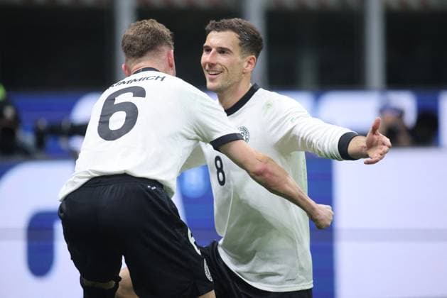 CALCIO - UEFA Nations League - Quarter Finals - Italy vs Germany Sandro Tonali of Italy celebrating after scoring a goal with Joshua Kimmich of Germany during the UEFA Nations League, Quarter-finals, 1st leg, football match between the national team, Nationalteam of Italy and the national team of Germany, on 20 March 2025, at Giuseppe Meazza stadium, San Siro, Milan, Italy. Photo Nderim Kaceli Milan Italy  Copyright: xIPAxSport ABACAx