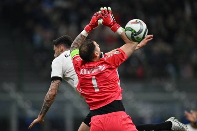 CALCIO - UEFA Nations League - Quarter Finals - Italy vs Germany Tim Kleindienst (GER) and Gianluigi Donnarumma (ITA) are in action during the UEFA Nations League quarter-final match between Italy and Germany at the San Siro Stadium on March 20, 2025 in Milan, Italy. Milan Italy  Copyright: xIPAxSport ABACAx