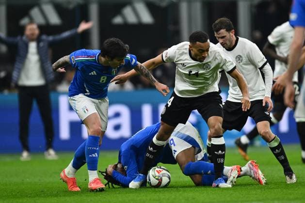 CALCIO - UEFA Nations League - Quarter Finals - Italy vs Germany Sandro Tonali (ITA) and Jamie Leweling (GER) are in action during the UEFA Nations League quarter-final match between Italy and Germany at the San Siro Stadium on March 20, 2025 in Milan, Italy. Milan Italy  Copyright: xIPAxSport ABACAx