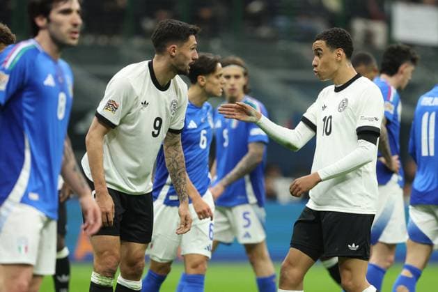 CALCIO - UEFA Nations League - Quarter Finals - Italy vs Germany Milan, Italy 20.03.2025: Tim Kleindienst of Germany, Jamal Musiala of Germany seen in action during the Uefa Nations League 2025, quarter finals, football match between Italy vs Germany at Giuseppe Meazza stadium in Milan. Milan Italy  Copyright: xIPAxSport ABACAx