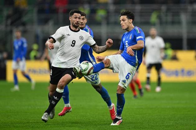 CALCIO - UEFA Nations League - Quarter Finals - Italy vs Germany Tim Kleindienst (GER) and Samuele Ricci (ITA) are in action during the UEFA Nations League quarter-final match between Italy and Germany at the San Siro Stadium on March 20, 2025 in Milan, Italy. Milan Italy  Copyright: xIPAxSport ABACAx