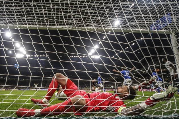 CALCIO - UEFA Nations League - Quarter Finals - Italy vs Germany Gianluigi Donnarumma of Italy falls into the net of the soccer goal during Italy vs Germany, Quarter-finals, 1st leg of Uefa Nations League 2025, game at Giuseppe Meazza - San Siro stadium in Milano (MI), Italy, on March 20, 2025. Milan Italy  Copyright: xIPAxSport ABACAx