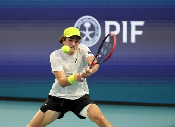 March 20, 2025, Miami Gardens, Florida, United States Of America: MIAMI GARDENS, FLORIDA - MARCH 20: Joao Fonseca of Brazil defeats Learner Tien of the United States during their match on Day 3 at Hard Rock Stadium on March 20, 2025 in Miami Gardens, Florida. ...People: Joao Fonseca Miami Open 2025 - Day 3  - ZUMAs214 20250320_ada_s214_165 Copyright: xSMGx