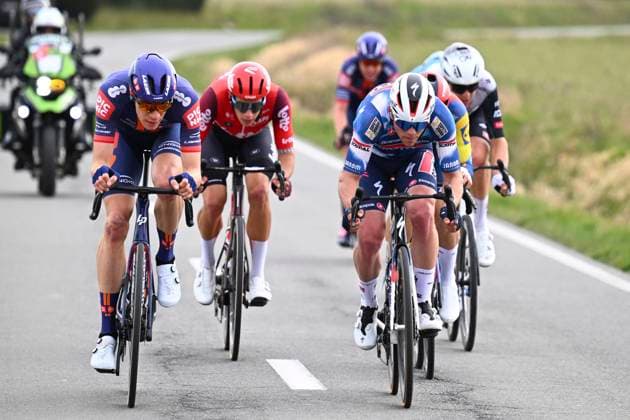Bredene Koksijde Classic 2025 cycling race KOKSIJDE, BELGIUM - MARCH 21 : Eekhoff Nils (NED) of Team Picnic PostNL, Segaert Alec (BEL) of Lotto, Lamperti Luke (USA) of Soudal Quick-Step during the Men Elite UCI 1.Pro 23rd Bredene Koksijde Classic cycling race with start in Bredene and finish in Koksijde (201 km) on March 21, 2025 in Koksijde, Belgium, 21 03 2025 ( Motordriver Stephan Boone & Koksijde Belgium  Copyright: xTomasxSiskx