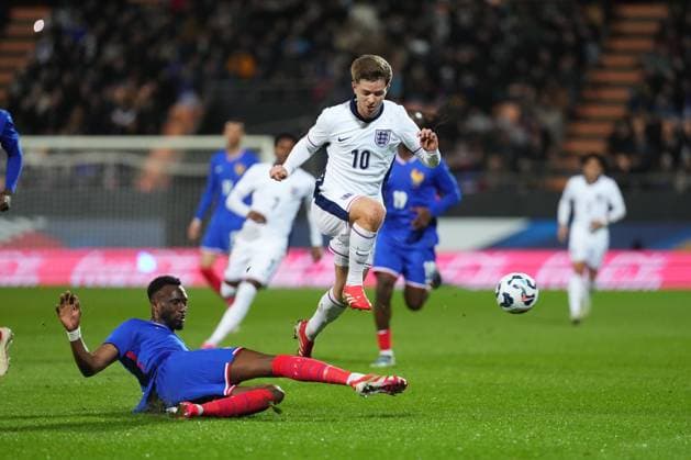 James McAtee of England takes on Christian Matsima of France France U21, U 21 v England U21, International Friendly, Länderspiel, Nationalmannschaft Football, Stade du Moustoir, Lorient, France - 21 Mar 2025 EDITORIAL USE ONLY No use with unauthorised audio, video, data, fixture lists, club league logos or live services. Online in-match use limited to 120 images, no video emulation. No use in betting, games or single club league player publications. Copyright: xDavexWinter Shutterstockx 15215626aj