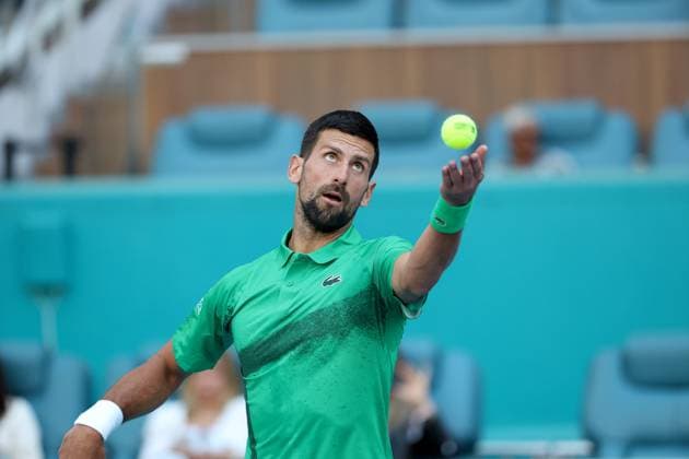March 21, 2025, Miami Gardens, Florida, United States Of America: MIAMI GARDENS, FLORIDA - MARCH 21: Novak Djokovic of Serbia defeats Rinky Hijikata of Australia during Day 4 of the Miami Open at Hard Rock Stadium on March 21, 2025 in Miami Gardens, Florida. ...People: Novak Djokovic Miami Open 2025 - Day 4  - ZUMAs214 20250321_ada_s214_005 Copyright: xSMGx