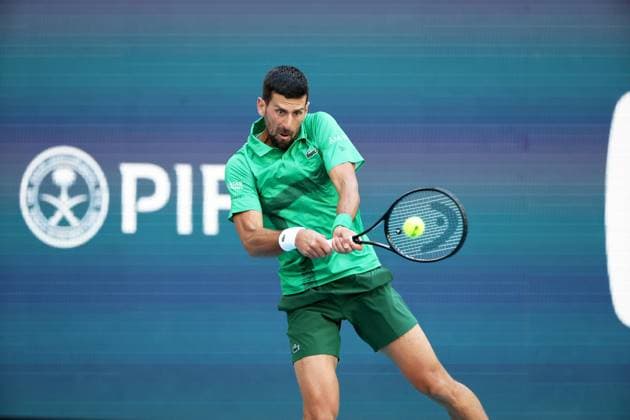 March 21, 2025, Miami Gardens, Florida, United States Of America: MIAMI GARDENS, FLORIDA - MARCH 21: Novak Djokovic of Serbia defeats Rinky Hijikata of Australia during Day 4 of the Miami Open at Hard Rock Stadium on March 21, 2025 in Miami Gardens, Florida. ...People: Novak Djokovic Miami Gardens United States Of America - ZUMAs214 20250321_ada_s214_001 Copyright: xSMGx