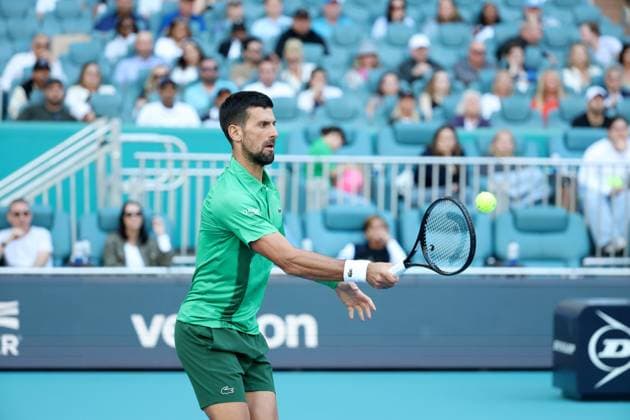 March 21, 2025, Miami Gardens, Florida, United States Of America: MIAMI GARDENS, FLORIDA - MARCH 21: Novak Djokovic of Serbia defeats Rinky Hijikata of Australia during Day 4 of the Miami Open at Hard Rock Stadium on March 21, 2025 in Miami Gardens, Florida. ...People: Novak Djokovic Miami Gardens United States Of America - ZUMAs214 20250321_ada_s214_036 Copyright: xSMGx