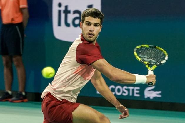March 21, 2025, Miami, Florida, USA: Carlos Alcaraz (ESP) returns a shot to David Goffin (not pictured) during the mens singles second round at the 2025 Miami Open presented by Itau at Hard Rock Stadium. Miami USA - ZUMAw109 20250321_fap_w109_007 Copyright: xDebbyxWongx