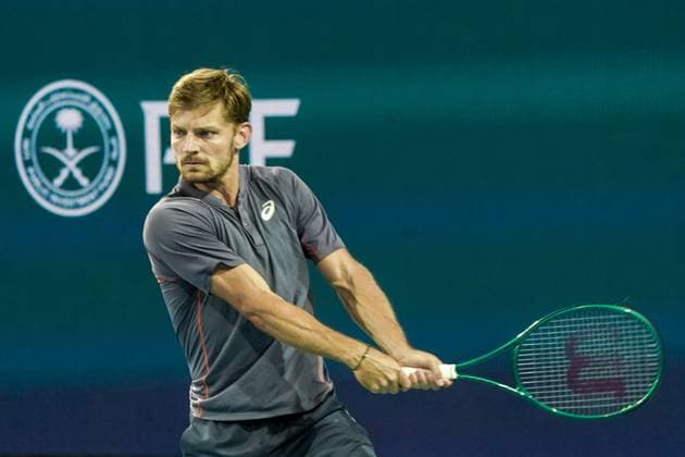 March 21, 2025, Miami, Florida, USA: David Goffin (BEL) returns a shot to Carlos Alcaraz (not pictured) during the mens singles second round at the 2025 Miami Open presented by Itau at Hard Rock Stadium. Miami USA - ZUMAw109 20250321_fap_w109_012 Copyright: xDebbyxWongx