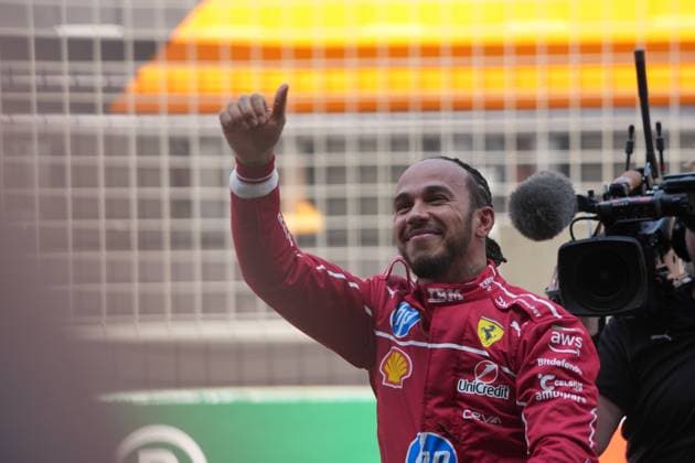 SHANGHAI, CHINA - MARCH 22: Ferrari driver Lewis Hamilton of Britain waves to fans after winning the sprint race of the Formula One Chinese Grand Prix at the Shanghai International Circuit on March 22, 2025 in Shanghai, China.  Copyright: xChinaxNewsxServicex 111556563309