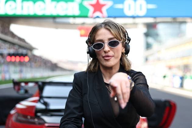 F1 Grand Prix Of China - Sprint & Qualifying An F1 DJ looks on the grid during the Sprint ahead of the F1 Grand Prix of China at Shanghai International Circuit in Shanghai, China, on March 22, 2025. Shanghai Shanghai China  Copyright: xPaddockerx originalFilename:paddocker-f1grandp250322_npIW3.jpg