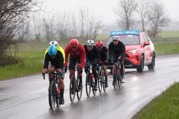 The pack rides cycles during the men s elite race of the Milano-Sanremo one day cycling race (289 km) from Pavia and to Sanremo - North West Italy - March 22, 2025. - cycling .  Copyright: xFabioxFerrari LaPressex