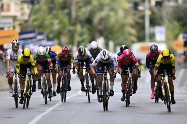 Belgian Lotte Kopecky of SD Worx-Protime (L), Dutch Lorena Wiebes of SD Worx-Protime (C) and Dutch Marianne Vos of Team Visma-Lease a Bike (R) sprint to the finish of the Milano-Sanremo one day cycling race for men, 289km from Milan to Sanremo, Italy, Saturday 22 March 2025. DIRKxWAEM  x115406740x